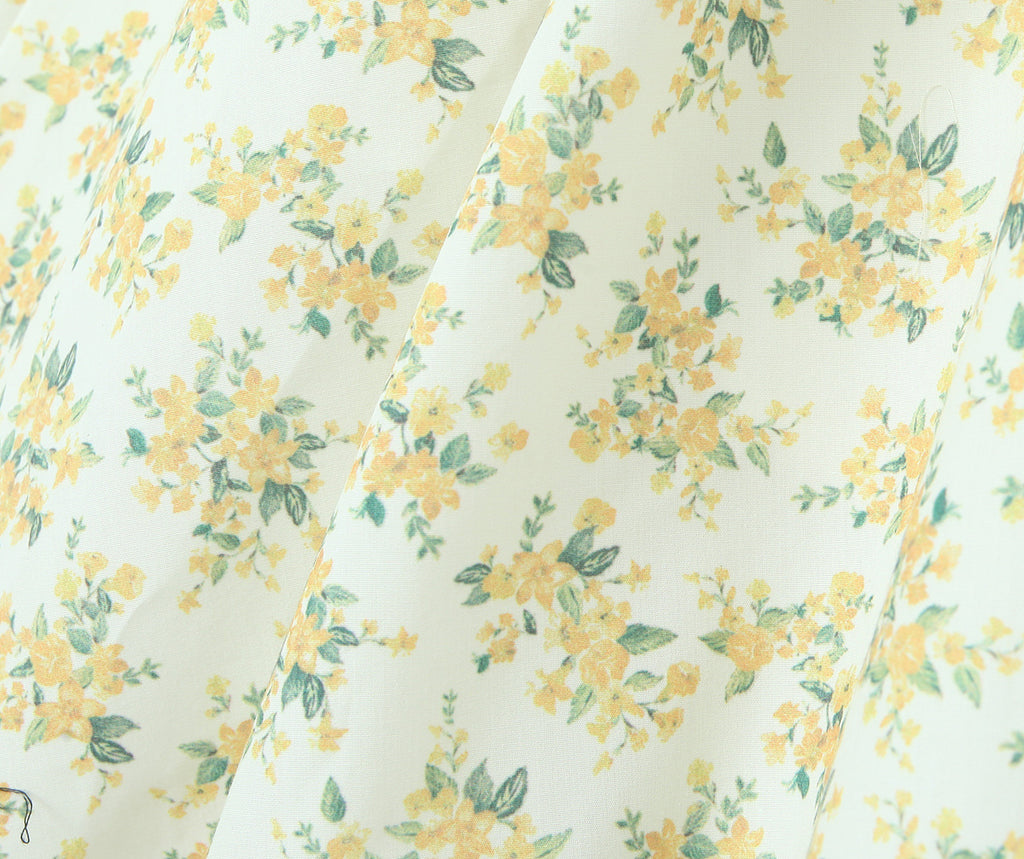 Robe sans manches florale licou en V style Hepburn français