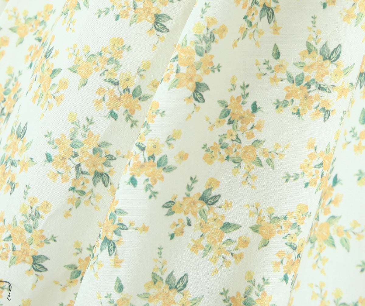 Robe sans manches florale licou en V style Hepburn français