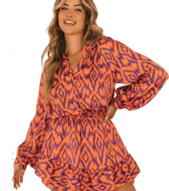 Robe à col montant imprimée à manches longues et taille élastique avec poches, pour l'export.