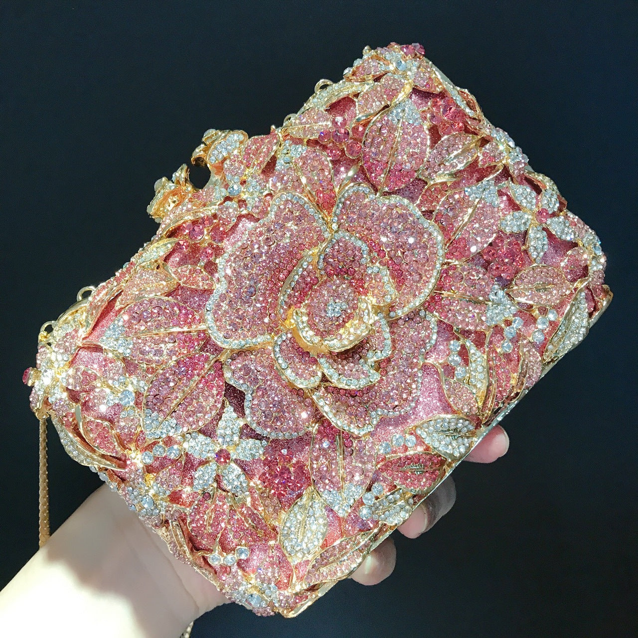 Pochette de soirée en métal rose, chaîne et diamants