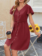 Robe de plage en coton et lin avec poches, manches papillon et boutonnage