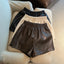 Short en similicuir taille haute pour femme, coupe ample, décontracté avec fente