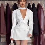 Blazer long ajusté style cache-cœur, à manches longues, taille marquée et basque pour femme