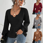 Pull femme à volants et taille ajustée