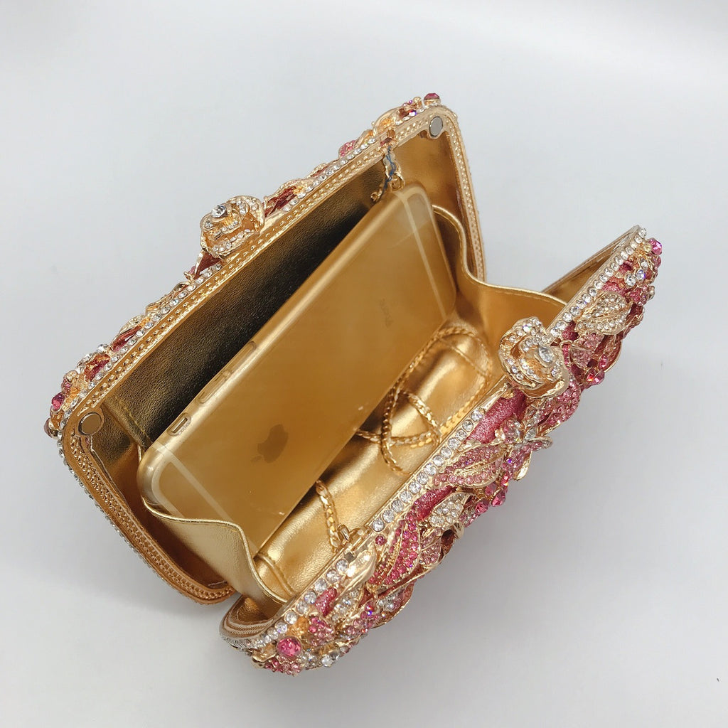 Pochette de soirée en métal rose, chaîne et diamants