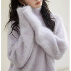 Pull col roulé en mohair gris pour femme