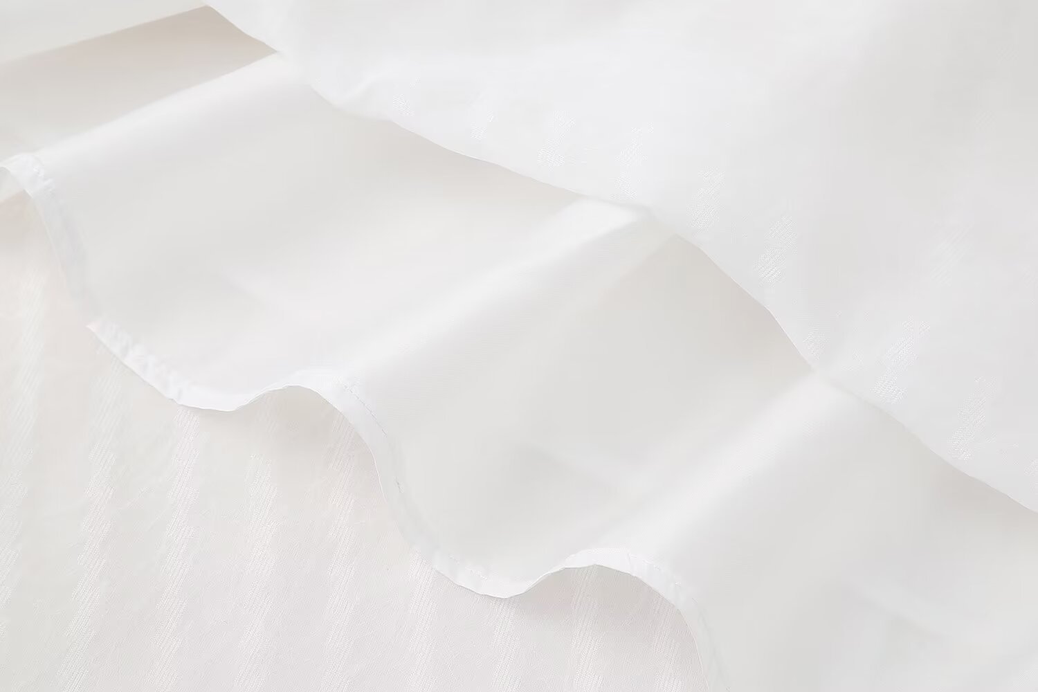 Robe sans manches à pompons pour femme