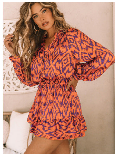 Robe à col montant imprimée à manches longues et taille élastique avec poches, pour l'export.