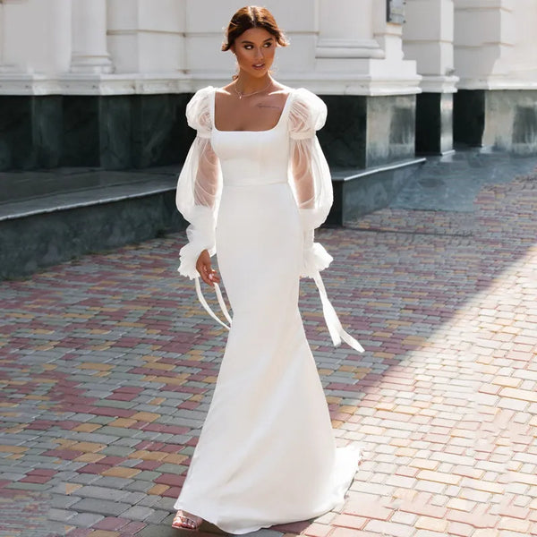 Robe de mariée sirène élégante en satin avec manches bouffantes longues